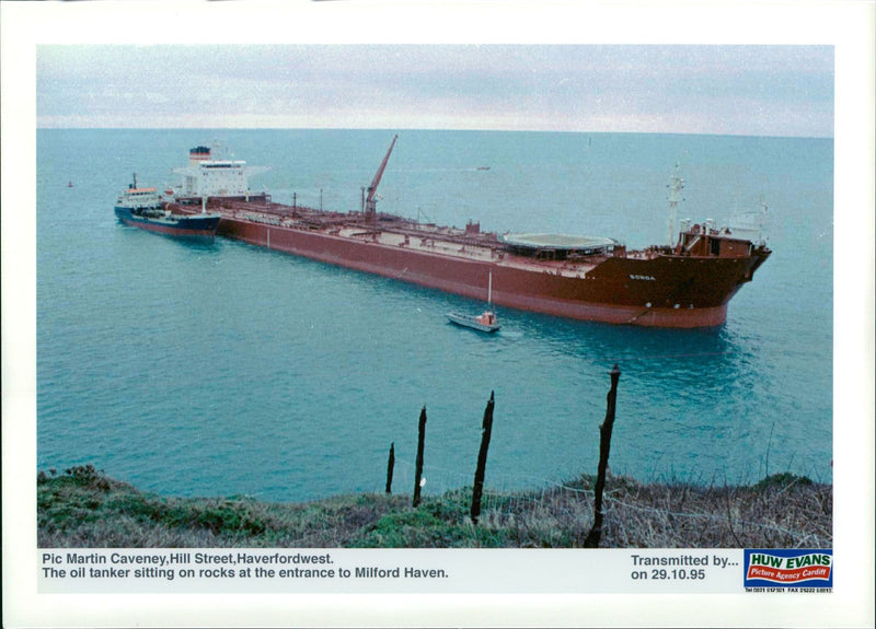 oil tanker sitting on the rocks. - Vintage Photograph