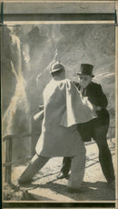 Members of the Sherlock Holmes Society re-enacting the last encounter between Conan Doyle's characters. - Vintage Photograph