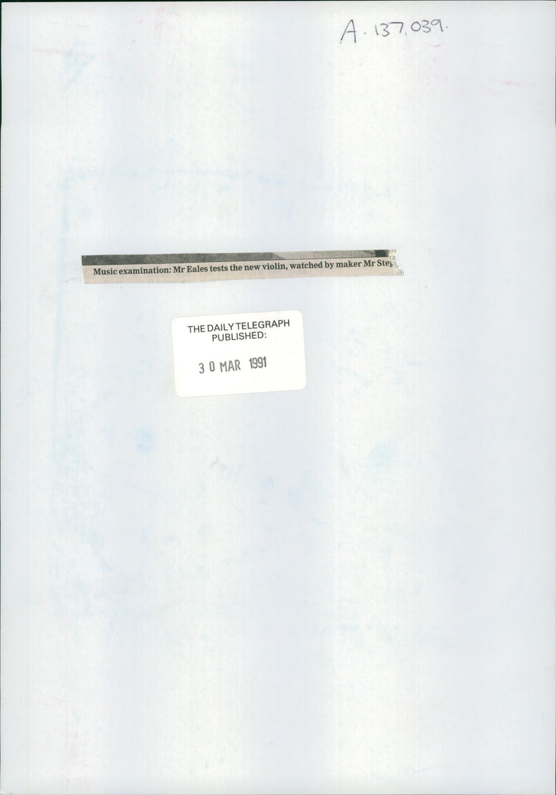 Musical instruments violine:mr eales tests the new violin - Vintage Photograph