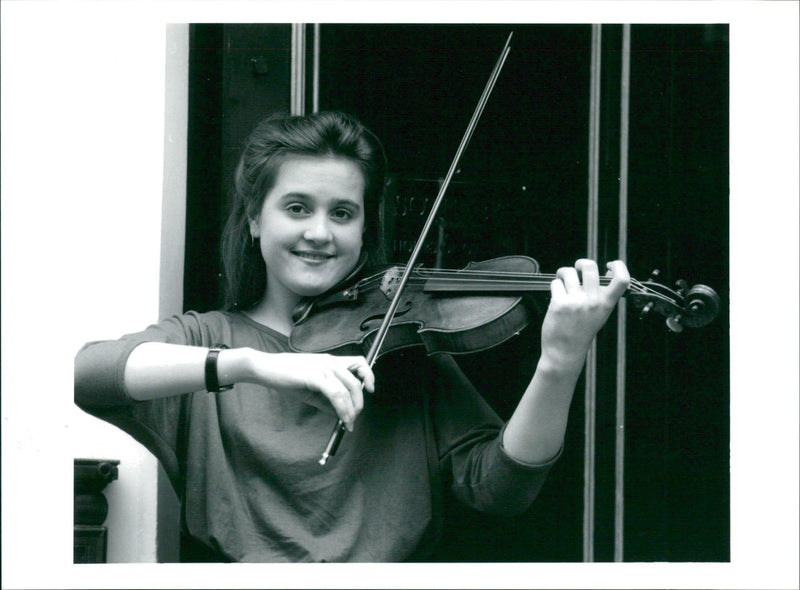 Musical instruments violine:young musician of the year - Vintage Photograph