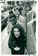 Music box audition. young people waiting outside. - Vintage Photograph