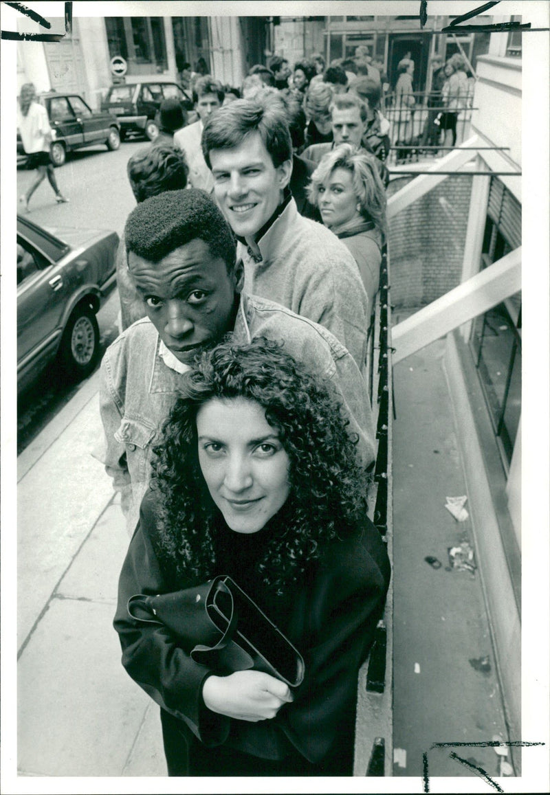 Music box audition. young people waiting outside. - Vintage Photograph