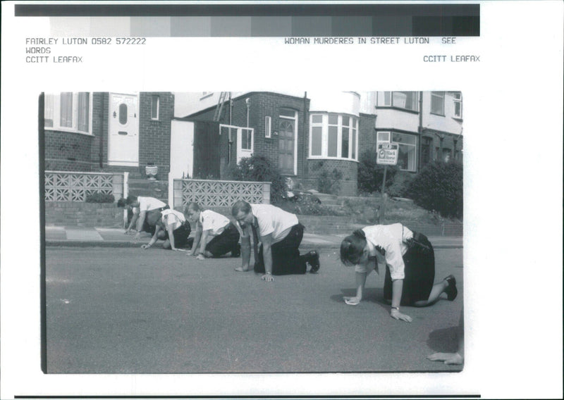 Woman murderers in street Luton. - Vintage Photograph