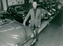 Gunnar LjungstrÃ¶m, with his premiere, Saab 92, in Saab's museum in TrollhÃ¤ttan - Vintage Photograph
