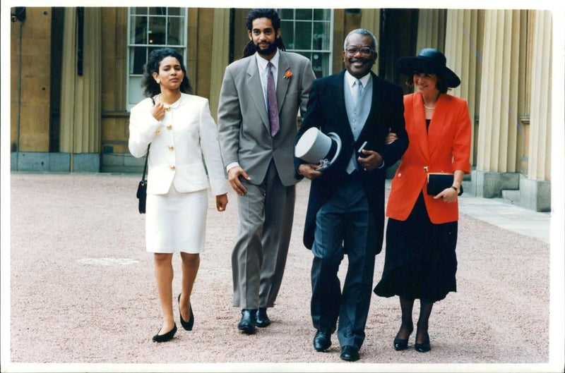 Trevor McDonald with his daughter wife and son Tim. - Vintage Photograph