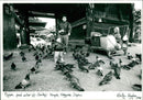 Pigeon tood seller - Vintage Photograph