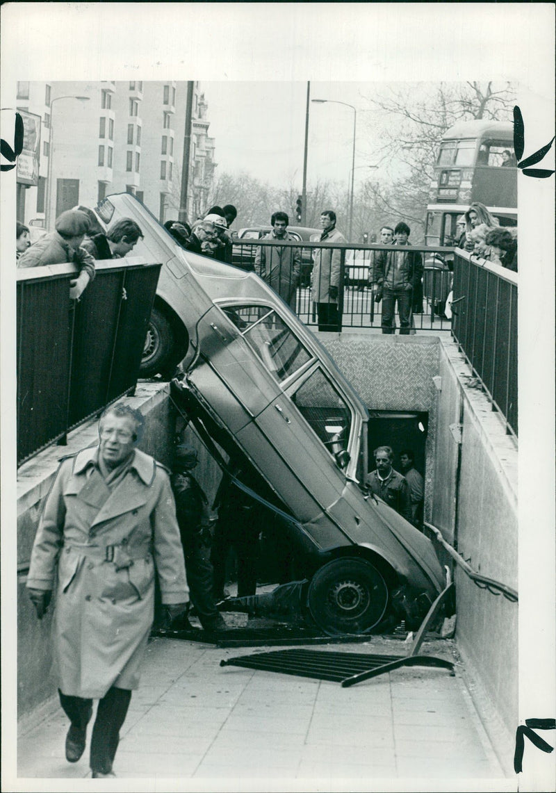 A mercedes hanging over the entrance to a pedestrian subway. - Vintage Photograph