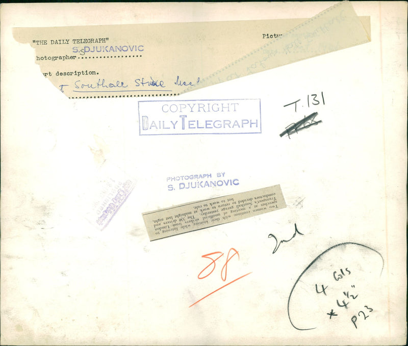 Strike (general) up to 1970:two women continue with their - Vintage Photograph