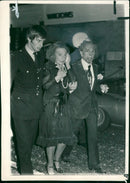 I.R.A bombings in london: an elegant couple bloodstained and shocked. - Vintage Photograph