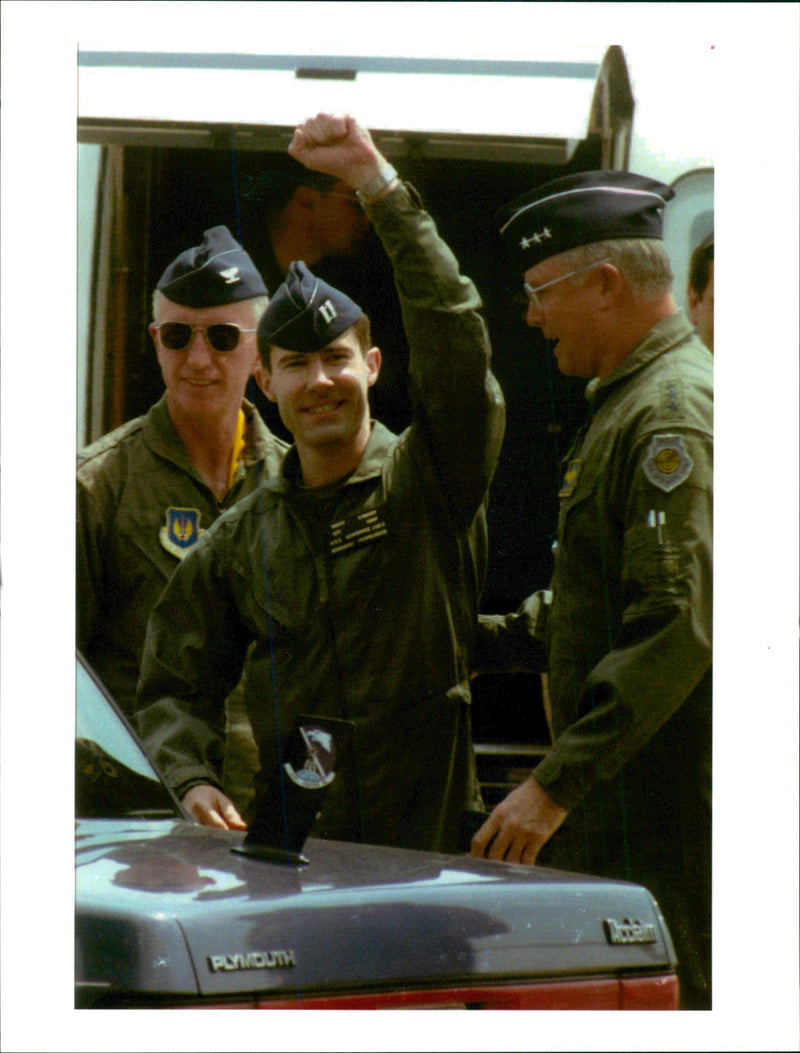 Scott O'Grady with some unidentified people. - Vintage Photograph