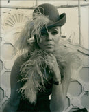 Fashions: one of the starange fashion for spring is this extended. - Vintage Photograph