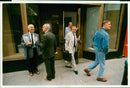 Poetry Society: members leaving the first meeting. - Vintage Photograph
