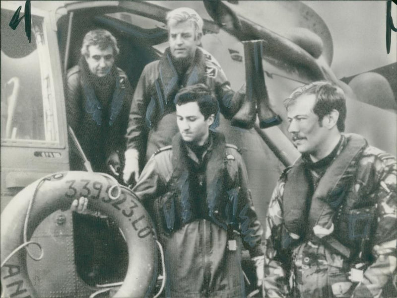 The crew of an RAF Sea King helicopter back at R A F Brawdy. - Vintage Photograph