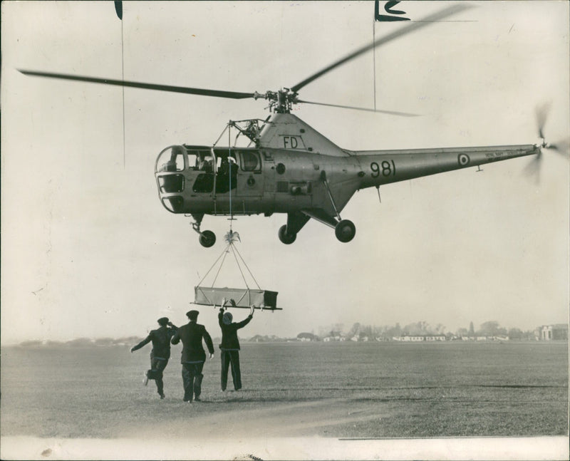 The stretcher from the helicopter. - Vintage Photograph