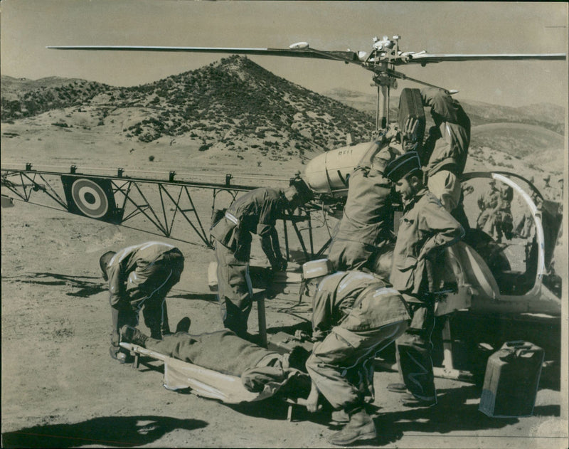 Helicopter takes wounded to hospital. - Vintage Photograph