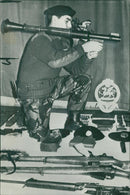 Ireland Civil Rights Riot:a soldier demonstrating a modern Russian. - Vintage Photograph