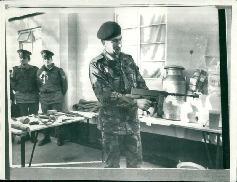 civil righh riots:a army officer with a wooden replica. - Vintage Photograph