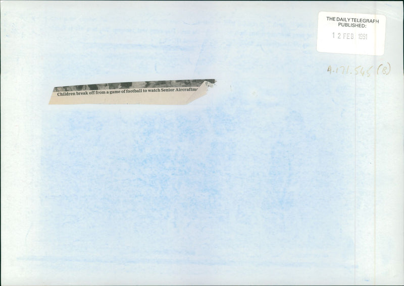 Gulf War:Children break off from a game of football. - Vintage Photograph