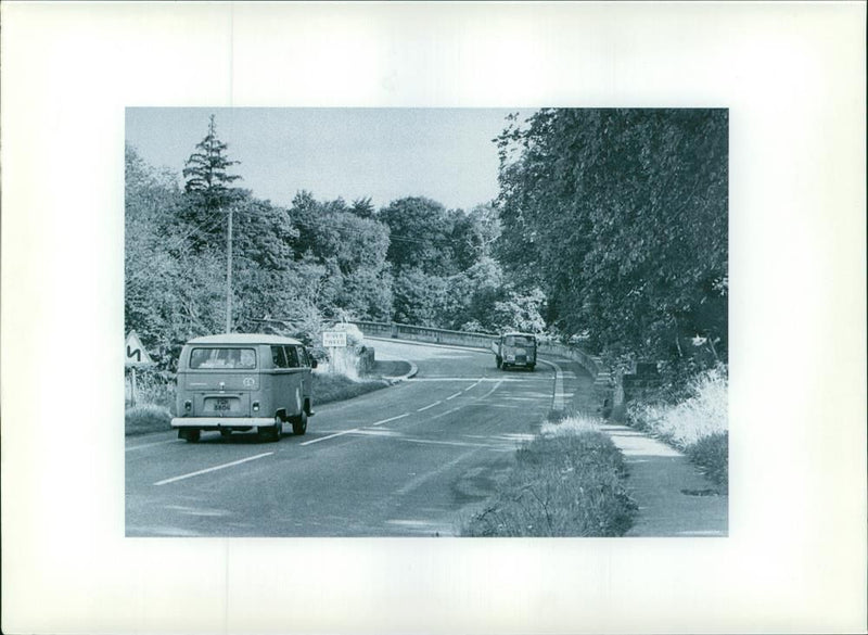 Some cars on the road. - Vintage Photograph