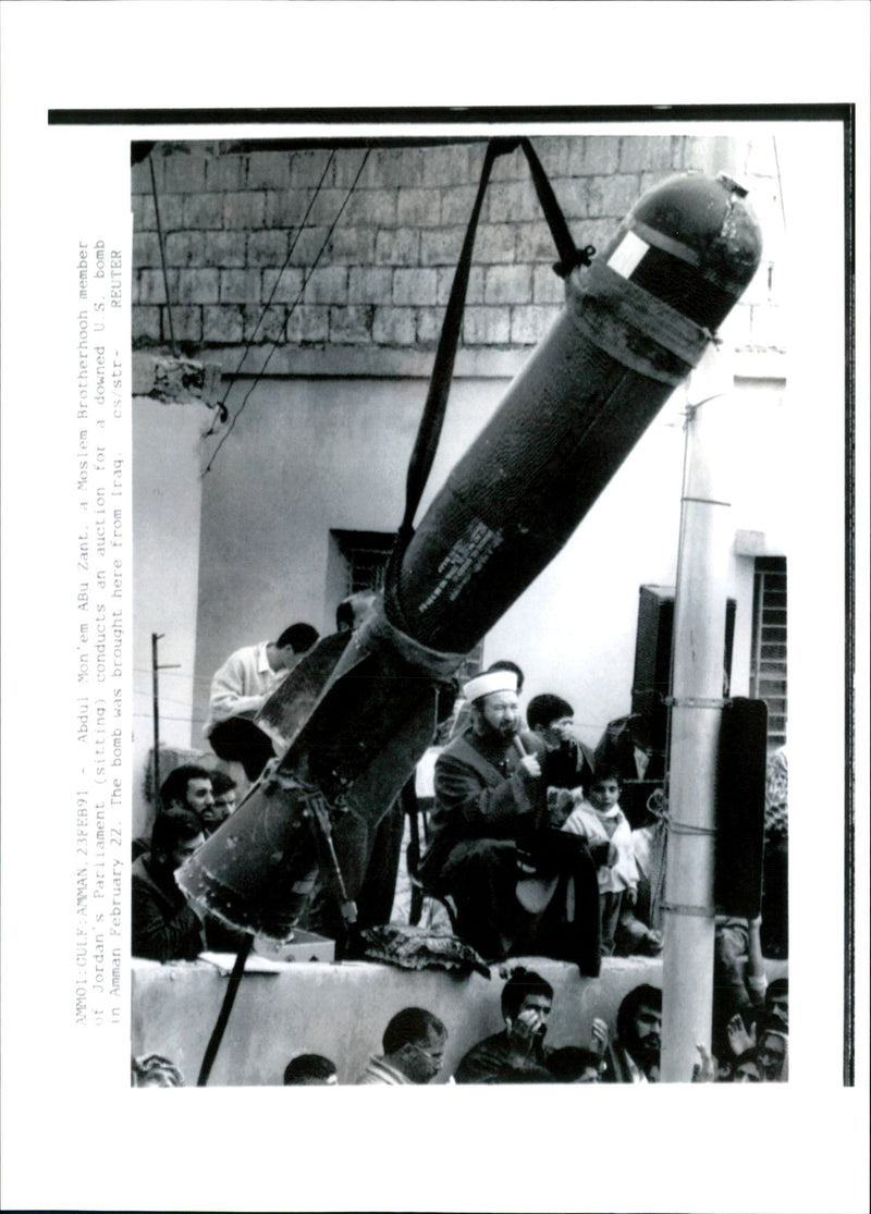 An unidentified weapon and some unidentified persons. - Vintage Photograph