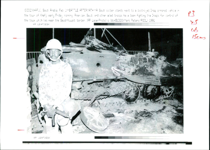 Iraq -un war kuwait city war damage:a saudi soldiers stands in front of an iraq. - Vintage Photograph