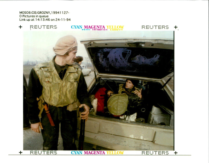 David Clark:An opposition fighter checks his heavy machine gun. - Vintage Photograph