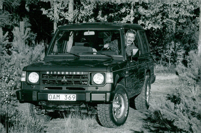 Anders Hultman in his Mitsubishi Pajero V6 - Vintage Photograph