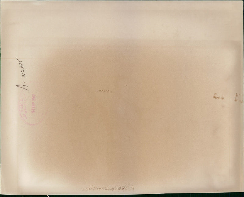 Soviet fashion designer Slava Zaitsev directs his model troupe at the start of a fashion tour in West Germany. - Vintage Photograph