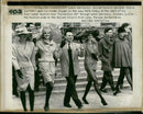 Soviet fashion designer Slava Zaitsev directs his model troupe at the start of a fashion tour in West Germany. - Vintage Photograph