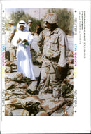A Kuwaiti official and a US marine. - Vintage Photograph