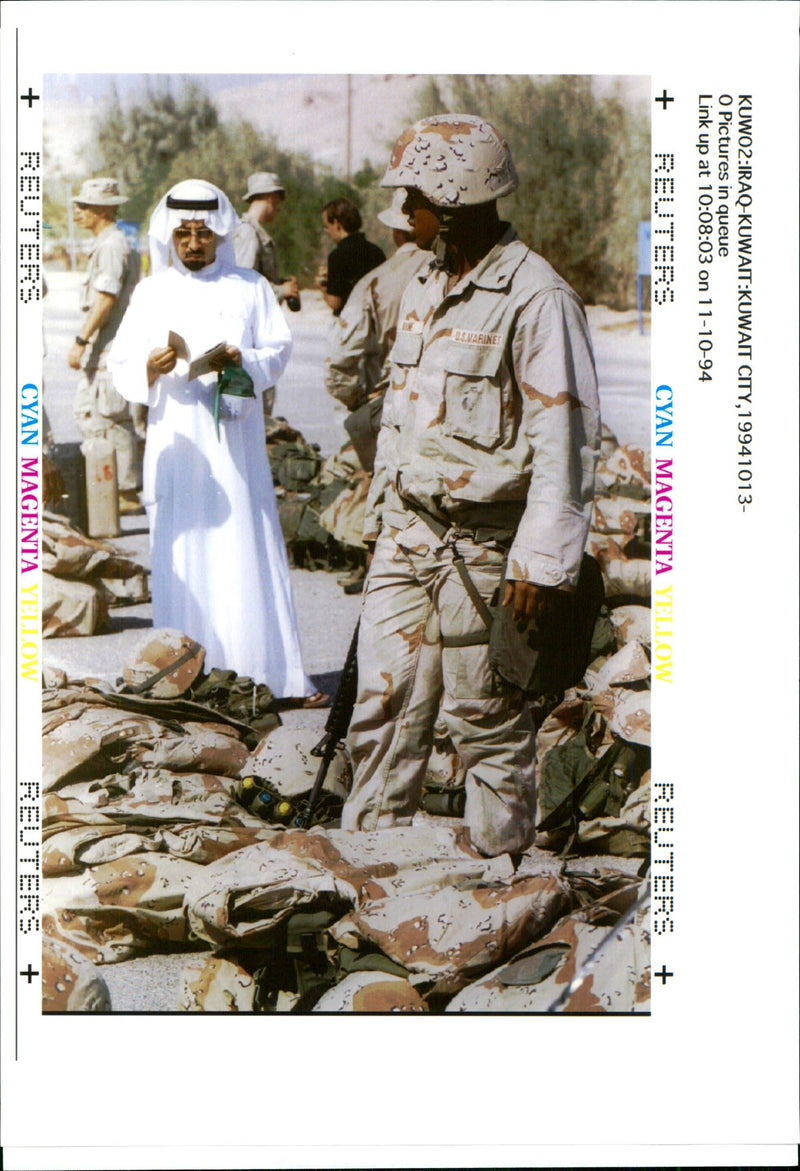 A Kuwaiti official and a US marine. - Vintage Photograph