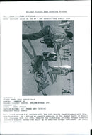 Media crowd around US marines. - Vintage Photograph