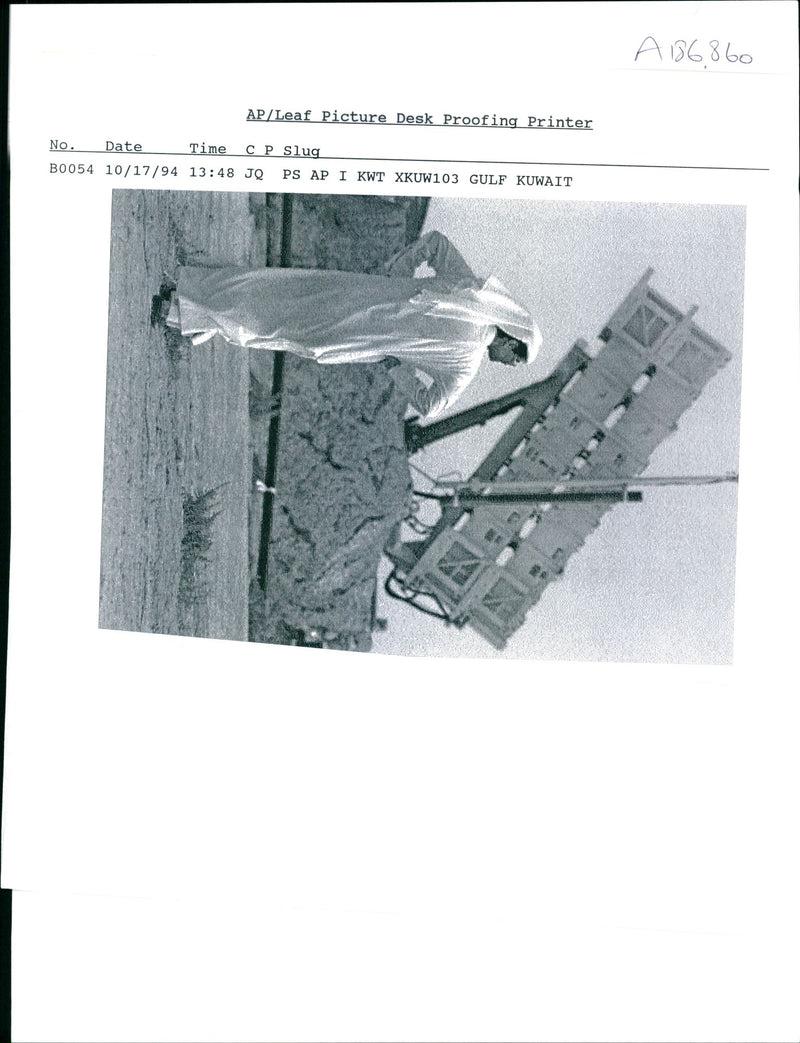 An unidentified person in white. - Vintage Photograph