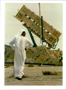 An unidentified person in white. - Vintage Photograph