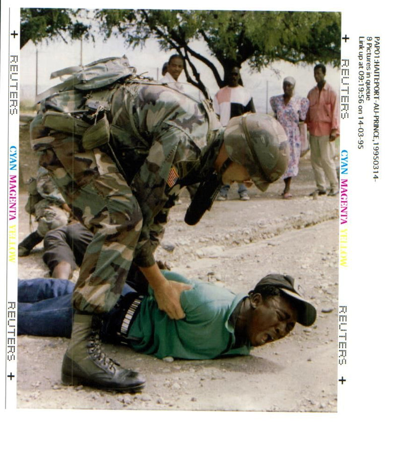 Us forces in haiti:a member of the us army military police. - Vintage Photograph