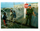 A British soldier on guard with Rwandan Children. - Vintage Photograph