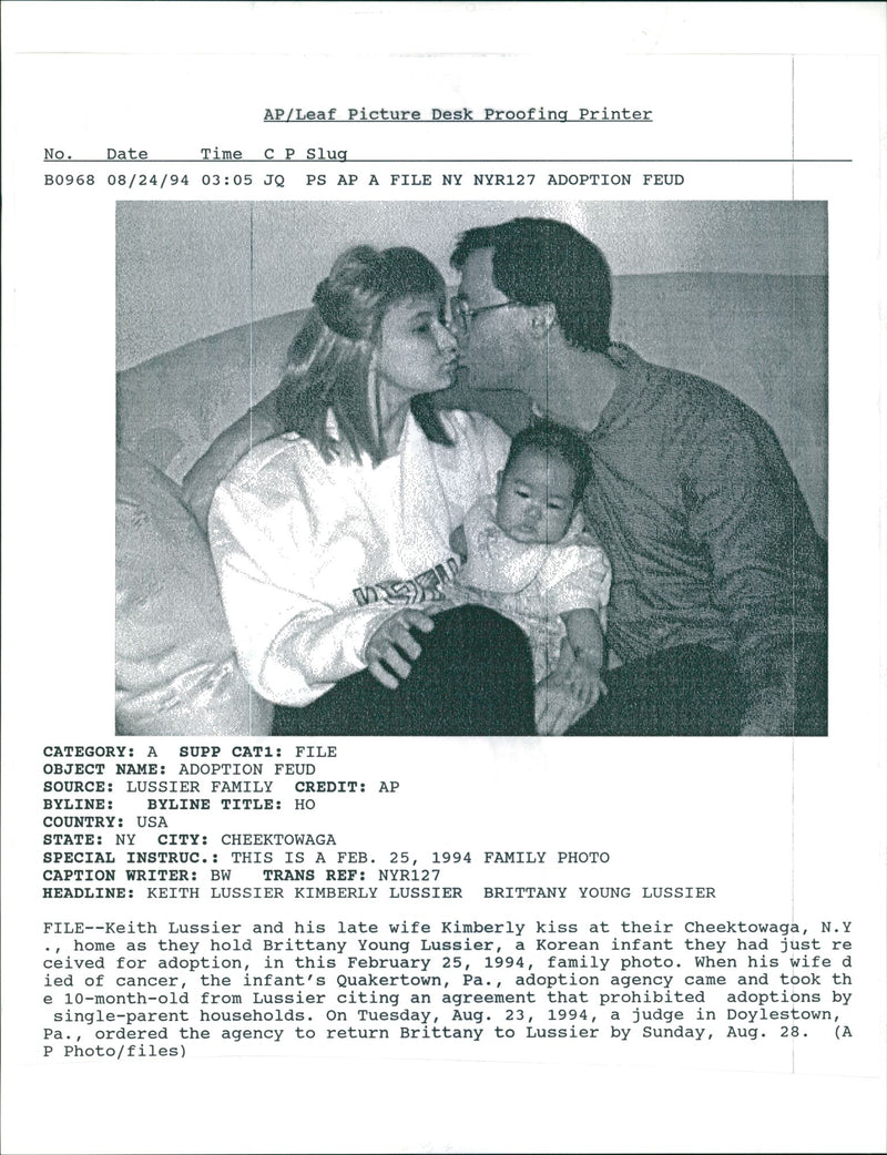 Keith Lussier with his late wife and his baby girl. - Vintage Photograph