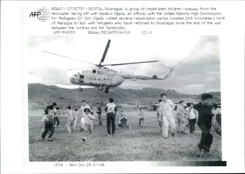 Martin Rogers:A group of repatriated children runaway. - Vintage Photograph