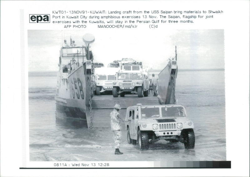 US Maneuvers in Kuwait: Landing craft from the USS Saipan. - Vintage Photograph