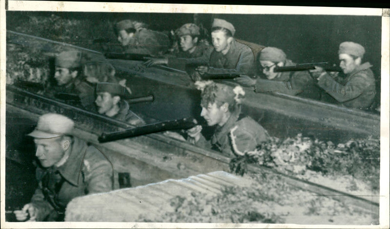 The AMIA bombing:loyal army troops taking cover behind railways. - Vintage Photograph