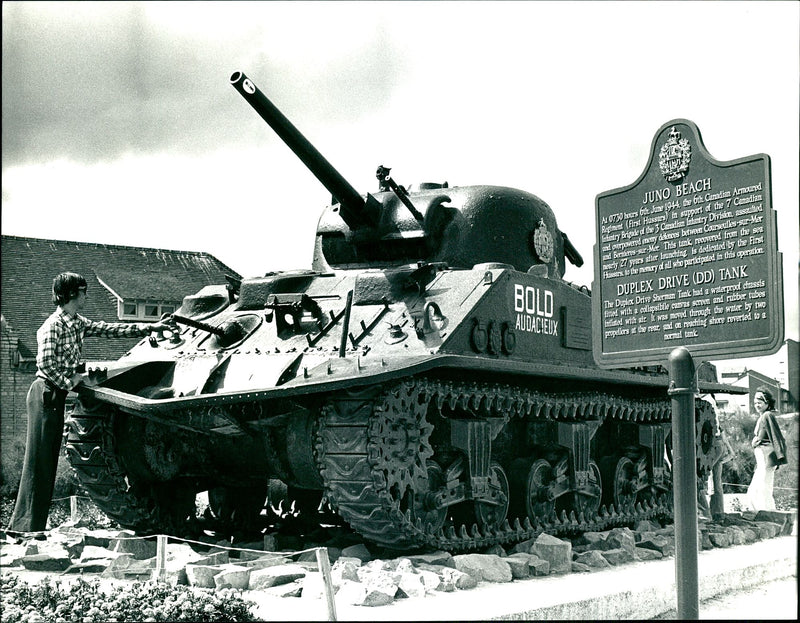 Courseulles-sur-Mer after twenty seven years in the sea this sherman tank. - Vintage Photograph