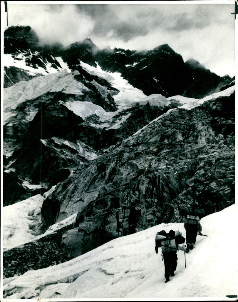 Members of the expedition making their way up. - Vintage Photograph