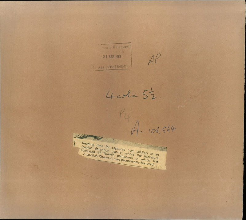 Reading time fro captured iraqi soldiers in an iranian detention centre. - Vintage Photograph