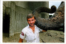 Bruce harman with dilberta the elephant. - Vintage Photograph
