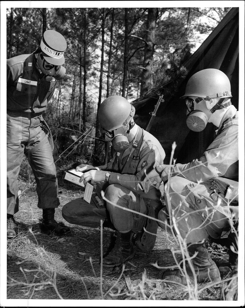 Basic trainees manever through a thick smoke. - Vintage Photograph