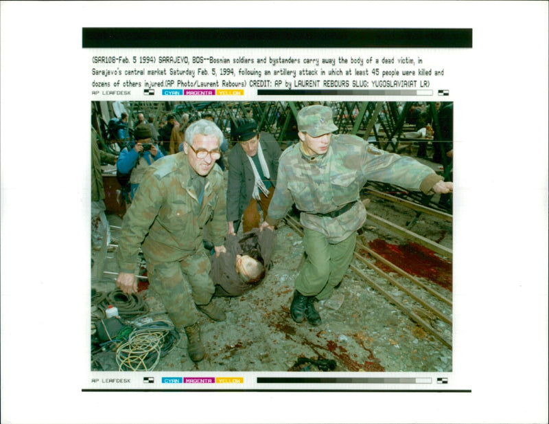 Bosnia soldiers and bystanders carry away. - Vintage Photograph