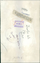 Sir Geoffrey Baker looking at the devastated homes in Belfast. - Vintage Photograph