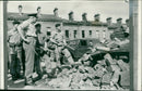 Sir Geoffrey Baker looking at the devastated homes in Belfast. - Vintage Photograph