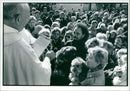 Priest blesses dogs on the festival. - Vintage Photograph