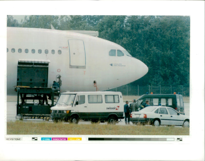 Police stand in front of the french airbus. - Vintage Photograph